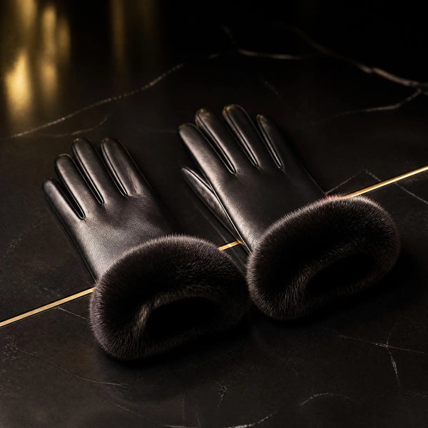 Black leather gloves with mink fur cuffs by Maison Fourrure
